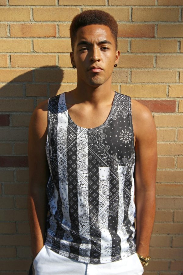 Isaac Floyd, the new president of Black United Students, stands outside of Oscar Richie Hall on Tuesday, Sept. 15, 2015. Isaac is a junior exercise science major at Kent State.