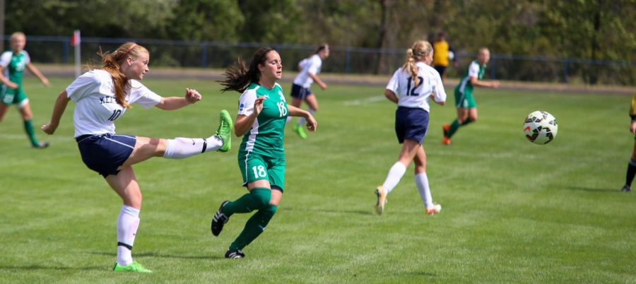 Freshman defender from the Flashes Paige Culver kicks the ball in a game against CSU on Sunday, Sept. 13, 2015.