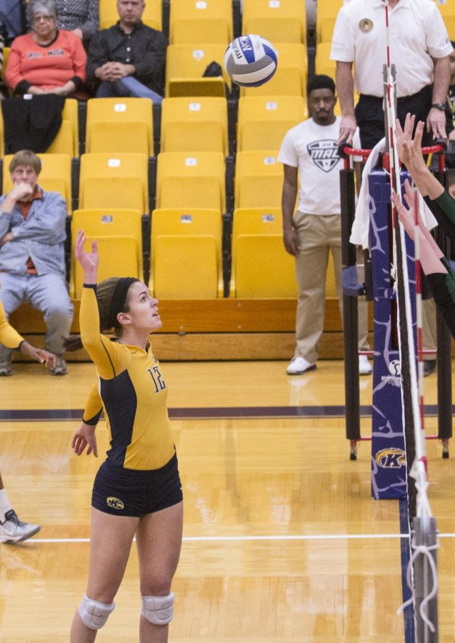 Kent State's Junior middle blocker Bridget Wilhelm goes up for a spike during their game against MAC opponents Ohio University in the M.A.C. Center on Thursday, Oct. 30, 2014. The flashes lost the game 3-1 bringing their overall record to 12-12.