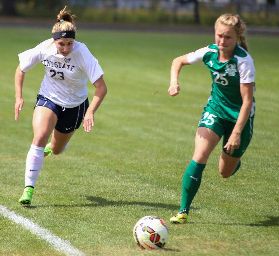 Junior forward Jenna Hellstrom pushes the ball up feild against CSU on Sunday Sept. 13, 2015.