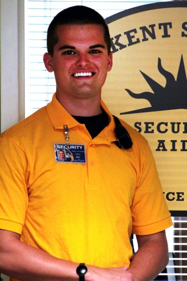 Chad Kozan, KSU security aide, stands outside the Security Office located in the Rotunda at Tri-Towers.