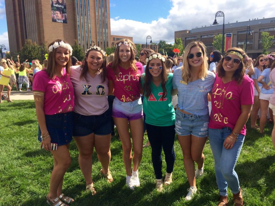 Sorority girls anxiously wait to greet their new members on Bid Day.