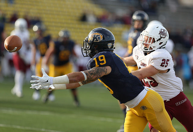 Kent State junior and wide receiver, Josh Boyle, misses the catch in a last minute play against The University of Massachusetts on Oct. 11, 2014. The Flashes lost 40- 17