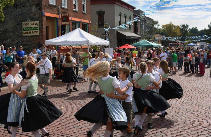 The German Family Society Youth Group dances outside Taco Tontos and the Loft in downtown Kent during Oktoberfest on September 26, 2015.