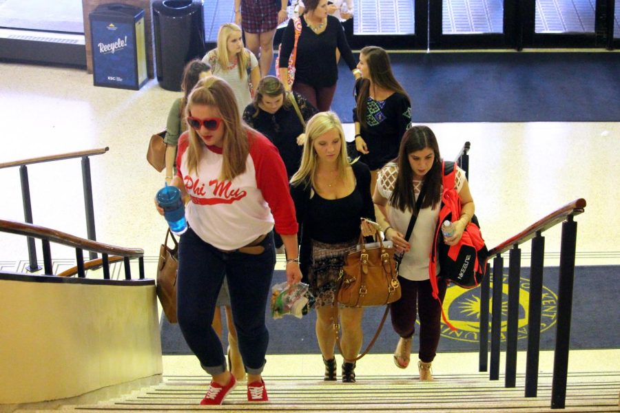 Members of one of Kent State's sororities walk to the second floor of the Student Center for a recruitment event on Wednesday, Sept. 16, 2015. 