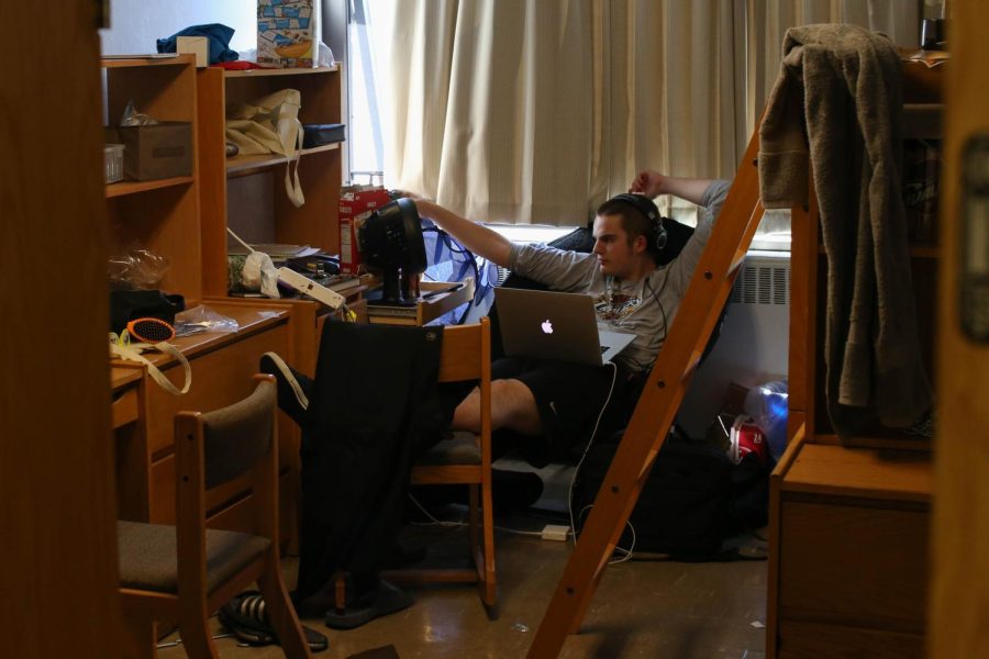 Freshman digital media production major Kyle Metzger watches a movie on his laptop in Olson Hall on Wednesday, Sept. 16, 2015.