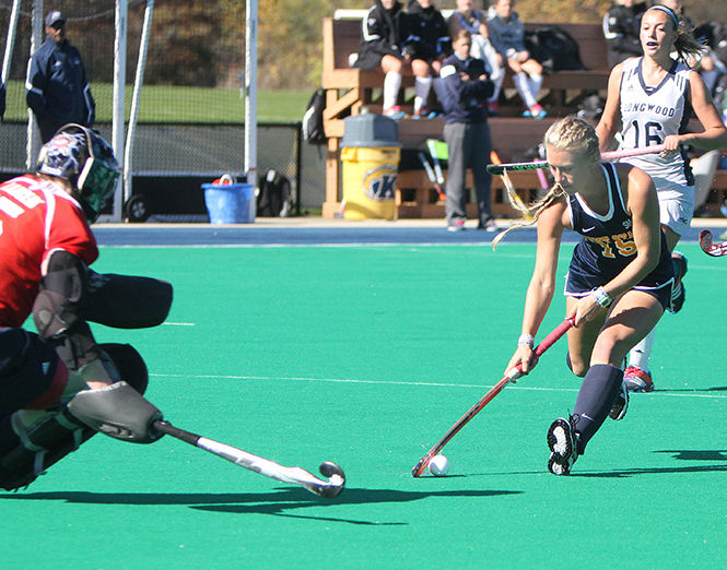 Sophomore midfielder Madison Thompson runs at the Longwood goal Sunday, Oct. 26, 2014 at Murphy-Mellis Field. The Flashes held on to a one-goal lead, scored in the first half by Hanna Faulkner, to win the game, improving their record to 8-8 and 5-0 in the MAC.