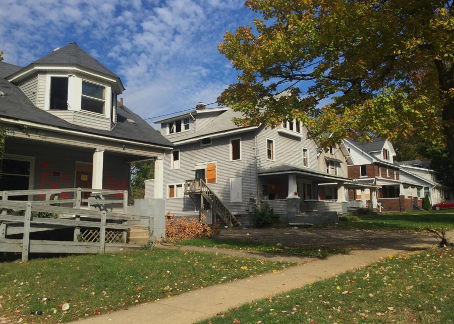 Houses on East College Avenue stand vacant with "No Trespassing" signs posted on front porches on October 12, 2015.