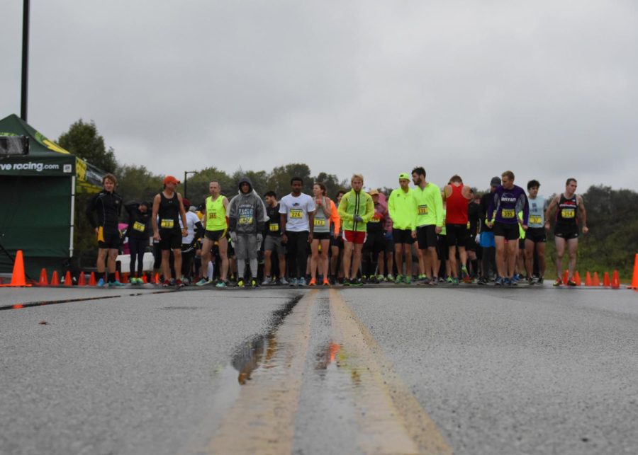 Runners stand poised at the starting line of the 15th annual Bowman VCup 5k race during Homecoming Weekend on October 3, 2015.