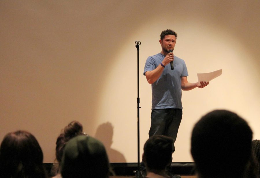 Dylan Webb recites a poem at a Poetry Slam event in the Kiva on Wednesday, Oct. 21, 2015.