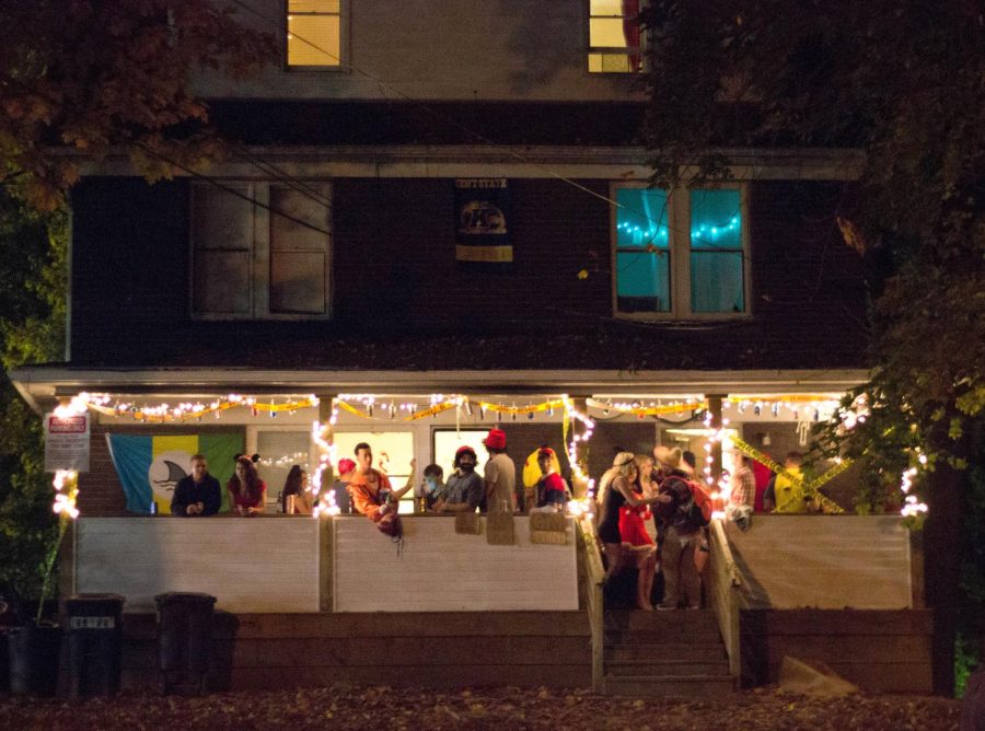 Students party at a house on University St. during Kent Halloween on Oct. 25, 2014.