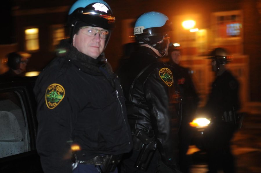 Police officers from Kent State, Kent City, and Brimfield were stationed in and around Downtown Kent for the annual Halloween festivities Saturday, Oct. 26, 2013. Some officers were on duty until as early as 7 a.m. to make sure rowdy partygoers did not get out of hand.