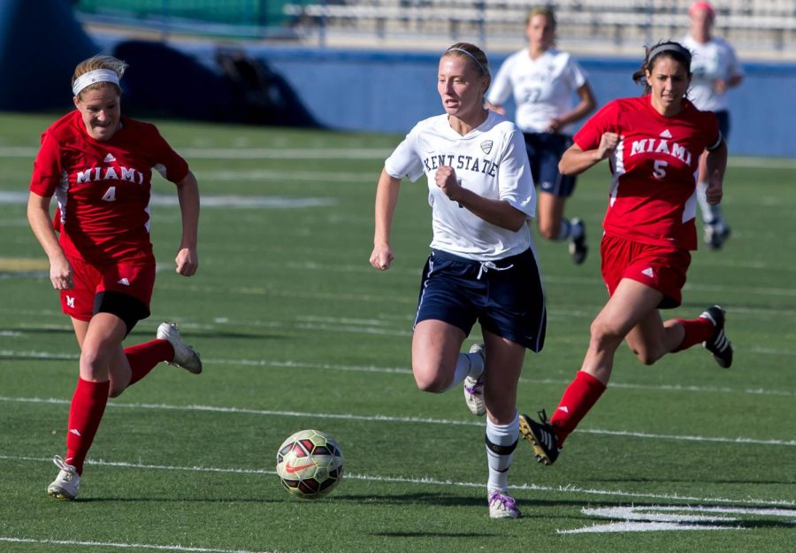 Nate Manley / The Kent Stater Sophomore forward, Karli Paracca, races a Miami defender down field on Sunday Nov. 1, 2015. The Flashes lost to Miami in penalty kicks. 