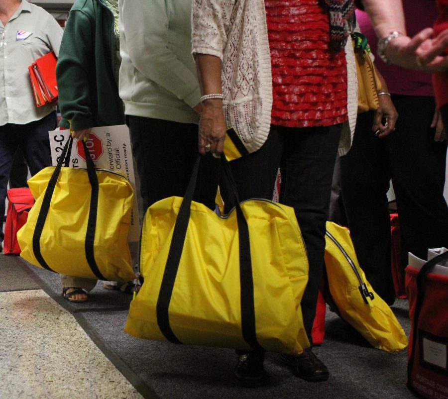 Election Officials wait in line to turn in ballots at Portage County Board of Elections on November 3, 2015.