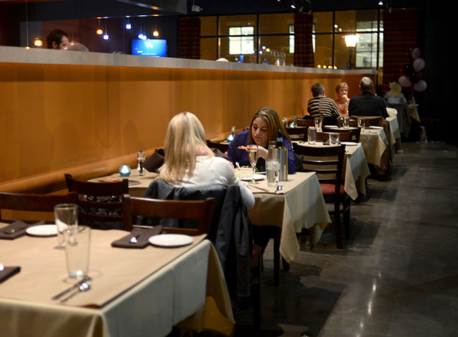 A dining room of guests enjoy Italian-style meals, Wednesday, Jan. 22, 2014, at Bricco downtown just 13 days after the restaurant's initial opening.