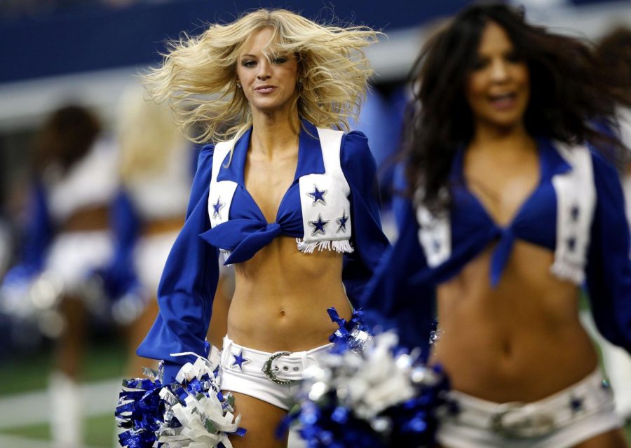 The Dallas Cowboys Cheerleaders perform during the second half between the Cowboys and Minnesota Vikings at AT&amp;T Stadium in Arlington, Texas, Sunday, November 3, 2013. The Cowboys defeated the Vikings, 27-23.