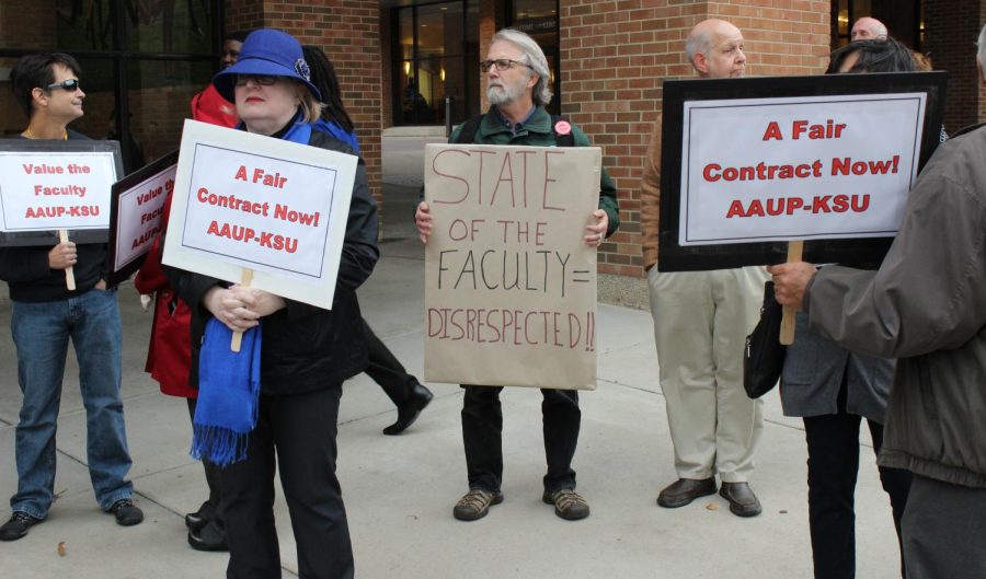 "If we want Kent State to be the best university it can be, we need to invest in the faculty," Patrick Coy (center), an applied conflict management professor of 2O years, said. "All administrators know that in their heart."