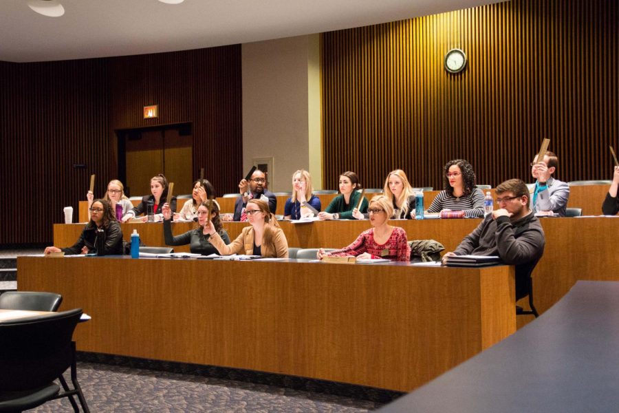 USG Senators take a vote on an student's individual conference request during a meeting on Wednesday, Jan. 27, 2016. Students and organizations can submit requests to the USG Allocations Committee for funding to attend conferences.