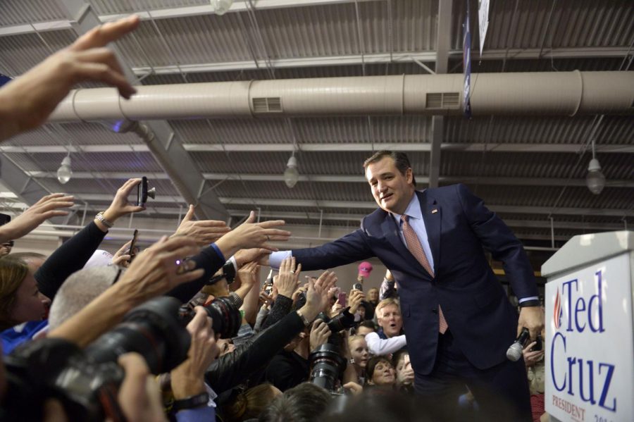 Senator Ted Cruz celebrates with supporters of his presidential campaign in Des Moines, Iowa after winning the Iowa Republican caucus on Monday, Feb. 1, 2016.