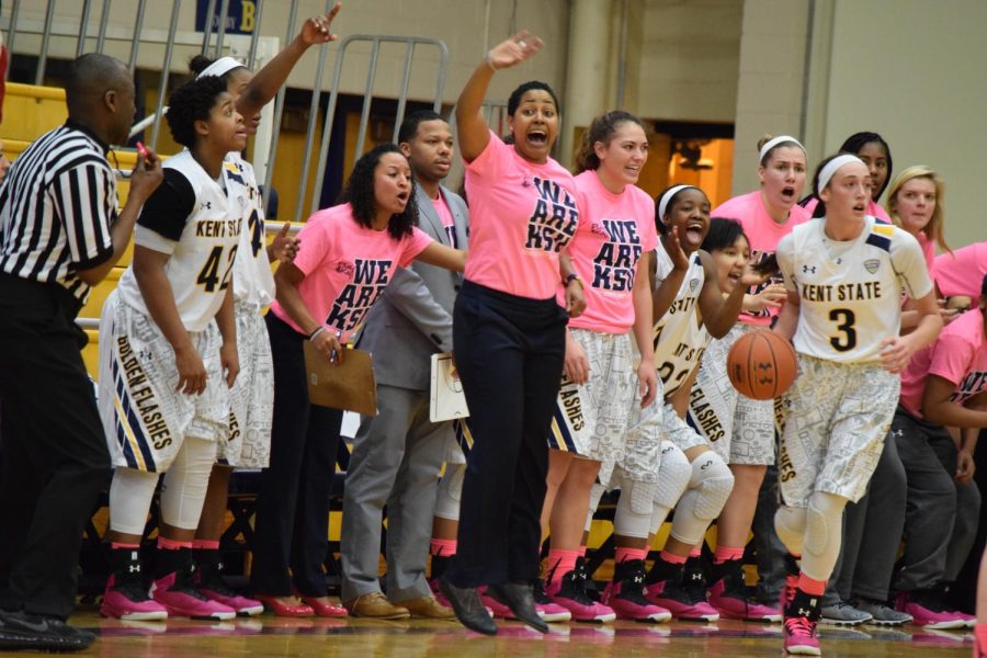 Coach Danielle O’Banion cheers on her team as they take on Ball State in the MAC Center on Saturday, Feb. 13, 2016. The Flashes won 59-50.