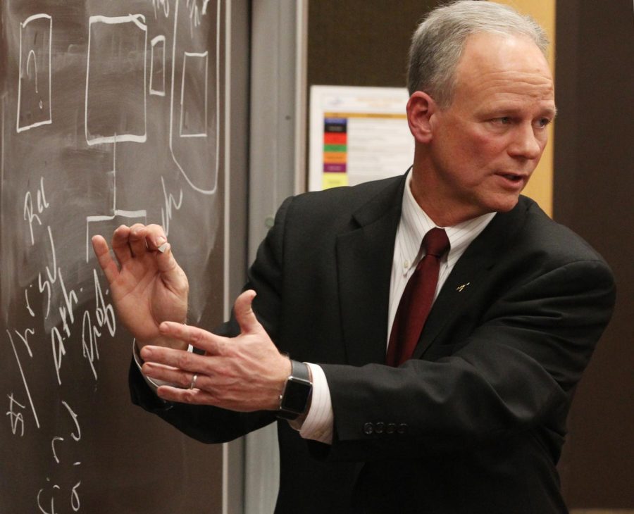 University of Akron President Scott Scarborough gives his report to the UA Faculty Senate during their meeting on Thursday, Feb. 4, 2016 in Akron, Ohio. Later in the meeting the senate voted and affirmed a resolution of no confidence in Scarborough. 