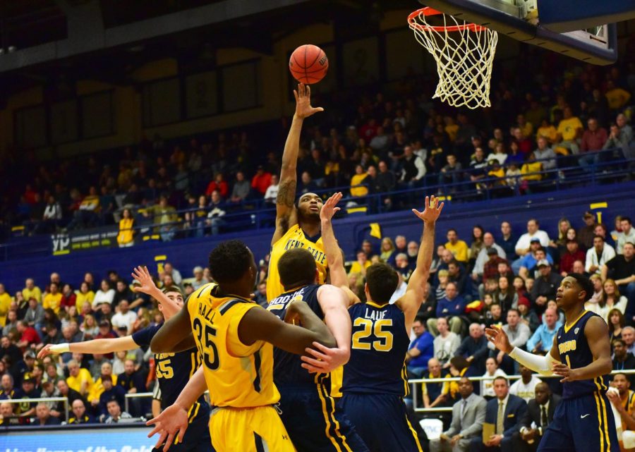 Senior center Khaliq Spicer shoots a two-point shot against The University of Toledo. Saturday February 6, 2016. The flashes lost 67-82.