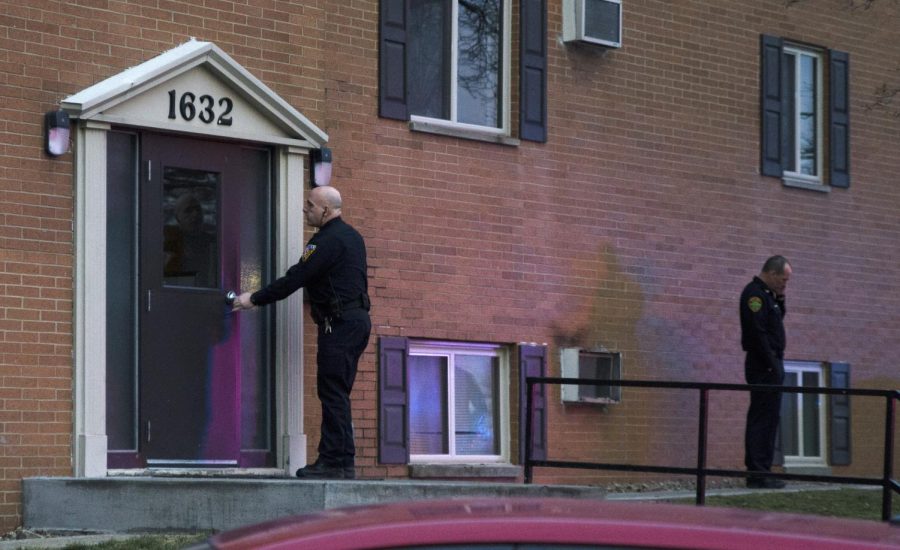 Police and investigators on the scene at the Ryan's Place apartment complex on Sunday, Feb. 7, 2016, following the shooting death of a Kent State freshman. The fourth suspect in the homicide, 17-year-old Anton Planicka, has pleaded not guilty to six felony charges.