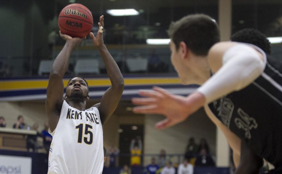 Guard Galal Cancer shoots the go-ahead free throw to give Kent State the win against Northern Illinois University on Tuesday, Feb. 9, 2016 at the M.A.C. Center.