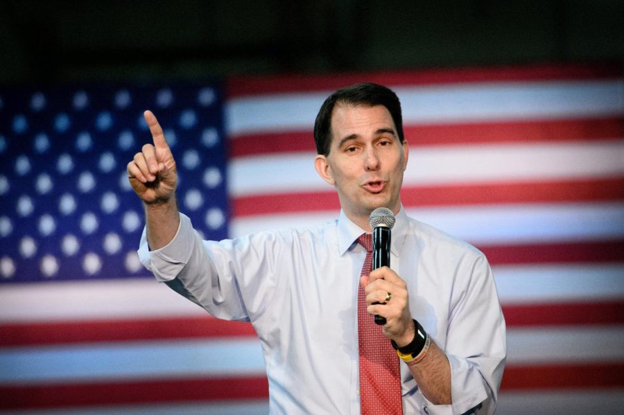 Wisconsin Gov. Scott Walker speaks to a small crowd at Cass Screw Machine Company on Aug. 18, 2015 in Brooklyn Center, Minn. Walker announced his "Day One Plan" to replace Obamacare.