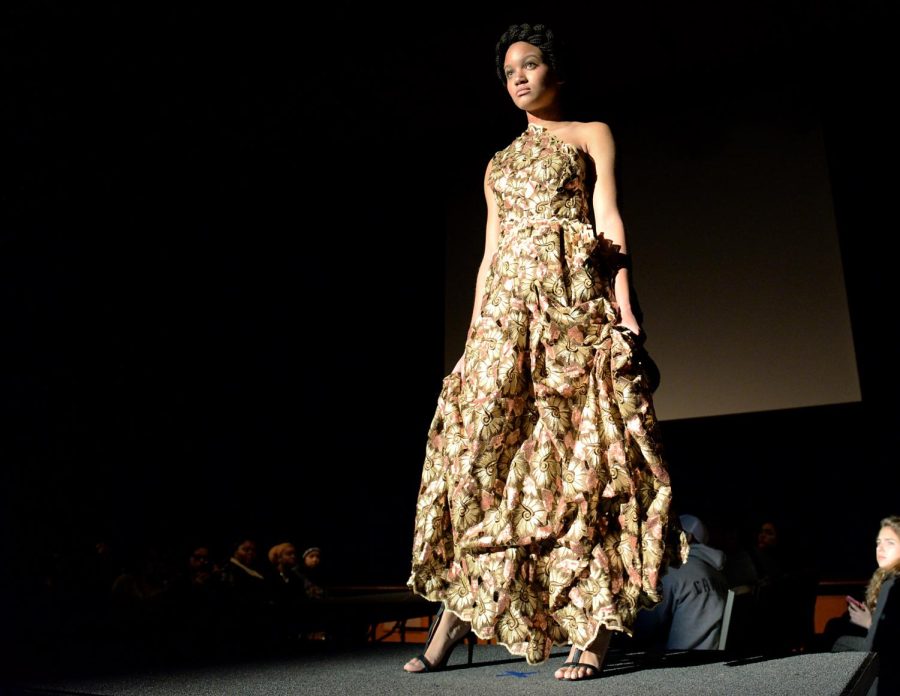 Model Brianna Hunter walks the runway at the UNCHAINED Fashion Show in the Kent State Student Center Ballroom on Monday, April 4, 2016.