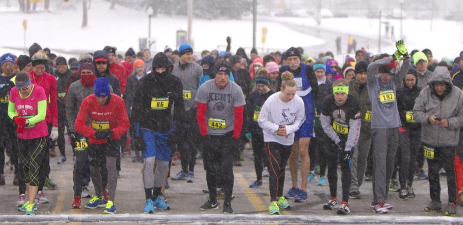 Runners wait at the starting line for the Black Squirrel 5K Race to start on Saturday, April 9, 2016.