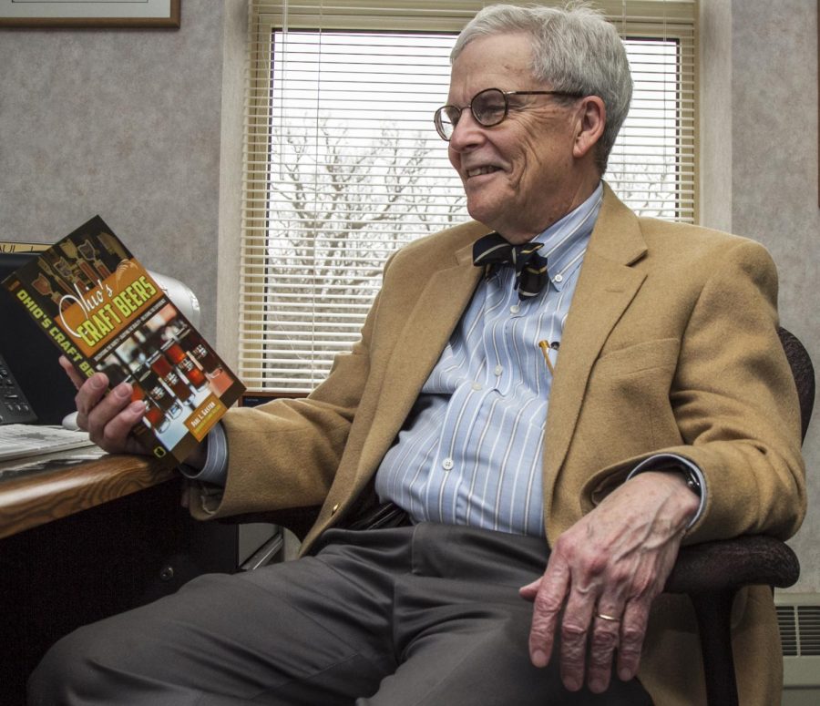 Trustee professor Paul Gaston holds his book, “Ohio’s Craft Beers,” which he released two weeks ago, in Moulton Hall on Monday, April 4, 2016. Gaston’s book documents over 40 of Ohio’s major breweries and offers in-depth profiles on their craft beers.