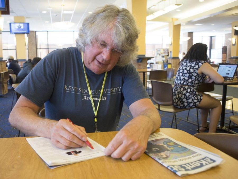 Calvin Carstensen, a 73-year-old student, sits in the Student Center on Monday, April 18, 2016. Calvin has been taking courses consistently every year as a guest/senior student since 2000, which is over 30 semesters.