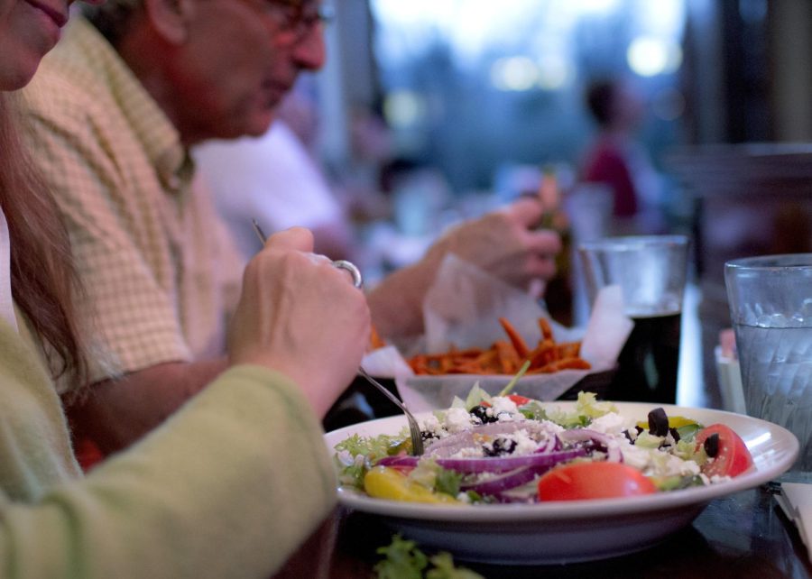 Barbara and Curt Van Blarcum enjoy dinner at Ray’s Place in downtown Kent on Monday, April 18, 2016.