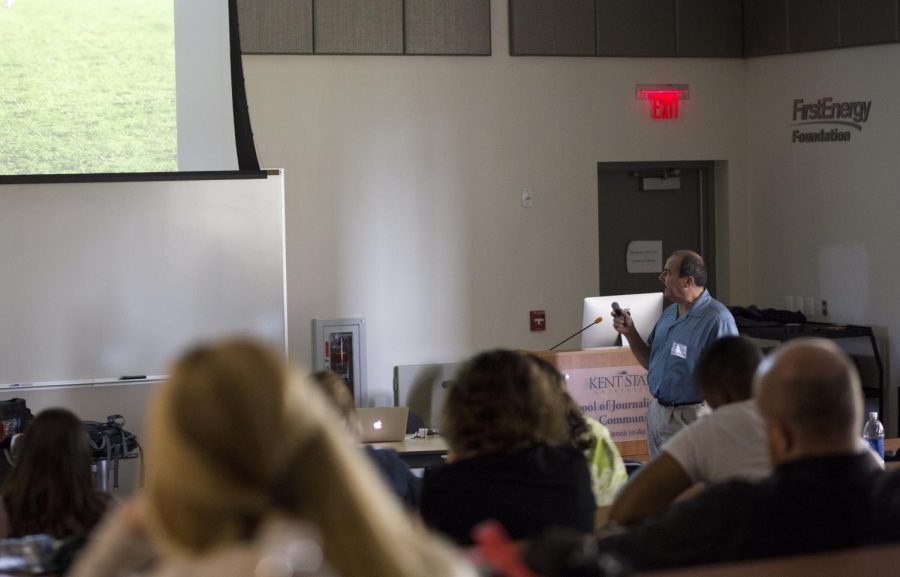 Boston photographer, Damian Strohmeyer, speaks to Kent State Students about the sports and business side of photography at ONPA held at Kent State University on April 24, 2014.