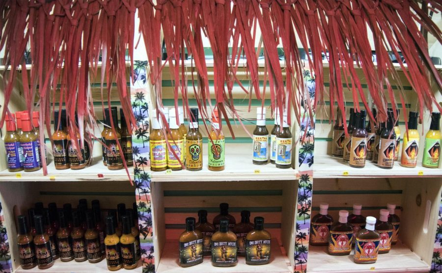 The wall of hot sauce at Dr. V &amp; G’s Sauce Shack in downtown Kent’s Acorn Alley on Sunday, June 26, 2016.