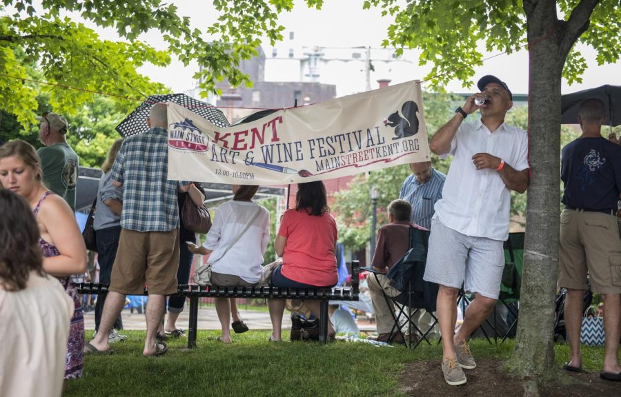 Residents of the city of Kent enjoy Kent Main Street's 10th annual Art and Wine Festival on Saturday, June 4, 2016. 