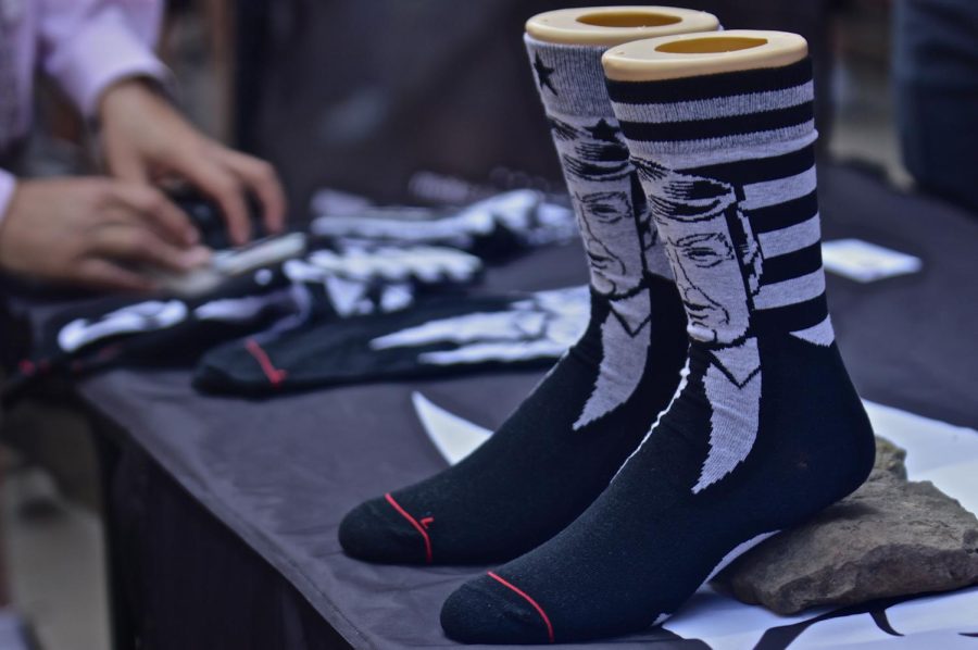 Florida tech entrepreneurs Chase Grause and Hayden Whetsonesell "Trump Socks" merchandise during the 2016 Republican National Convention on Wednesday, July 20, 2016. 