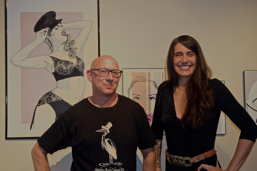 Jeff Ingram and Audrey Henry at the "Those Damn Dames" art gallery ope​​ning on Friday, July 8, 2016. Henry is the artist behind the art gallery which was helped made possible by the Standing Rock Cultural Art, a nonprofit organization where Ingram is the executive director.