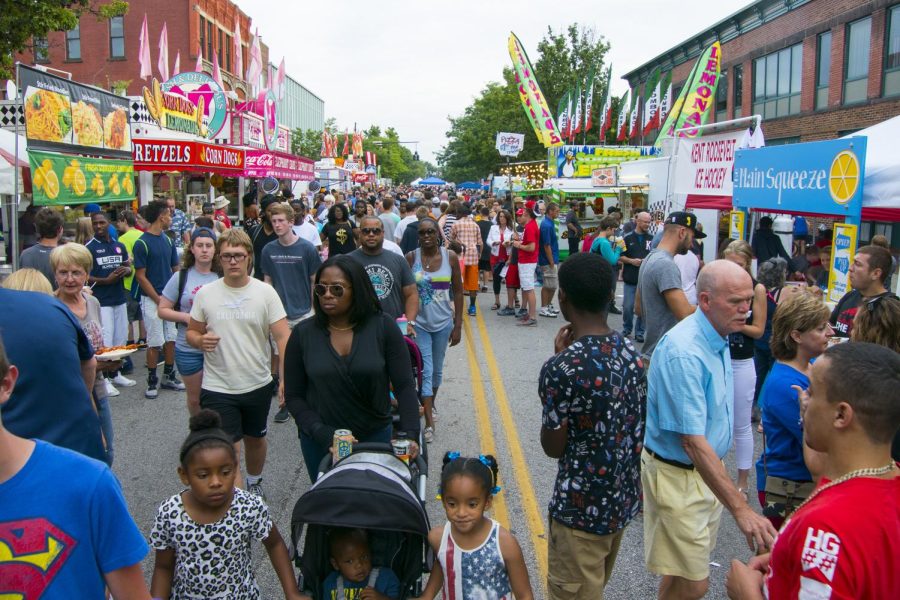 Attendees of the 21st annual Heritage Festival crowd North Water Street on Saturday, July 2, 2016. 