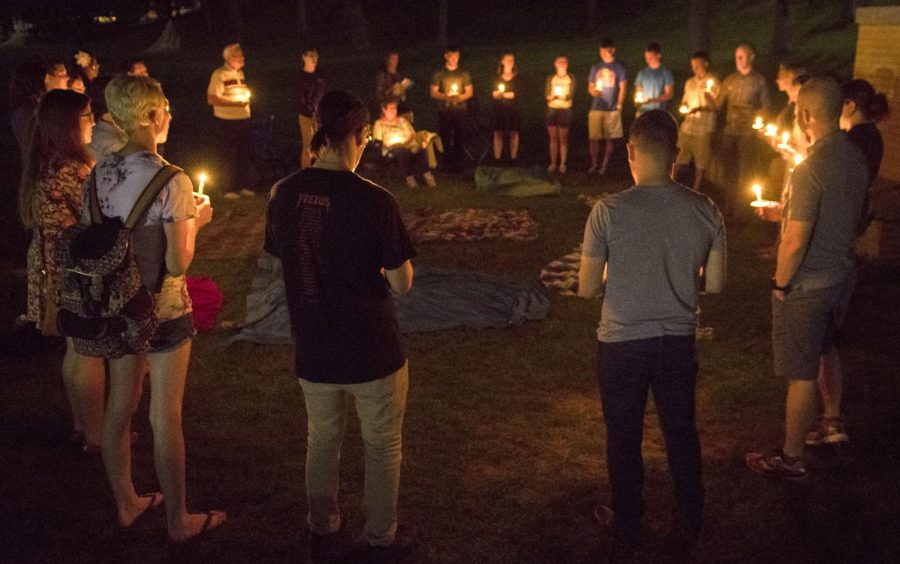 Mourners for Kent State student Jared Grieb tell stories and give prayers at the vigil held on Kent State's Memorial Field on Tuesday Aug. 30, 2016.