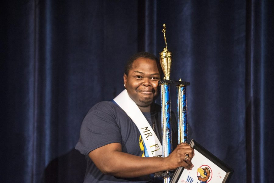 Senior Spanish literature, culture and translation major Victor Benton becomes emotional after being named 2016 Mr. Flash on Tuesday, Sept. 27, 2016 in the Kent State University Ballroom.