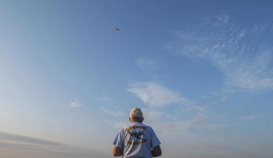 Larry Weimer is a memeber of the Kent Corsair model aircraft club and is flying one of his planes at the 20th Kent State Aeronautics Fair Saturday Sept. 10, 2016.