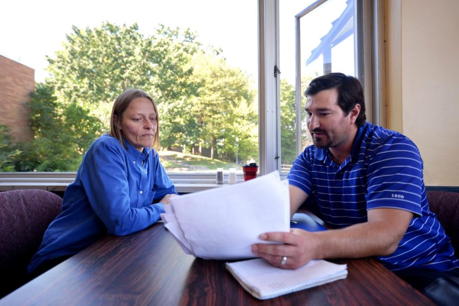 Matt Altieri, a teacher at Ravenna High School, shows Marlene Maneage, the manager at Prentice Café, a career project he’s looking over on September 20, 2016. Matt brings his students with special needs up to Kent State on weekday mornings for them to work in the café, gaining good work experience. “Marlene is realistic with the kids,” said Matt. “She doesn’t baby them, too many people try to baby them.”