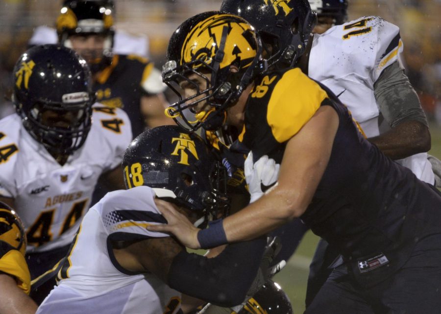 Alyssa Keown/The Kent Stater Kent State tight end Ryan Malone blocks North Carolina A&amp;T 39-36 on September 10, 2016. Kent State lost to North Carolina A&amp;T 39-36.