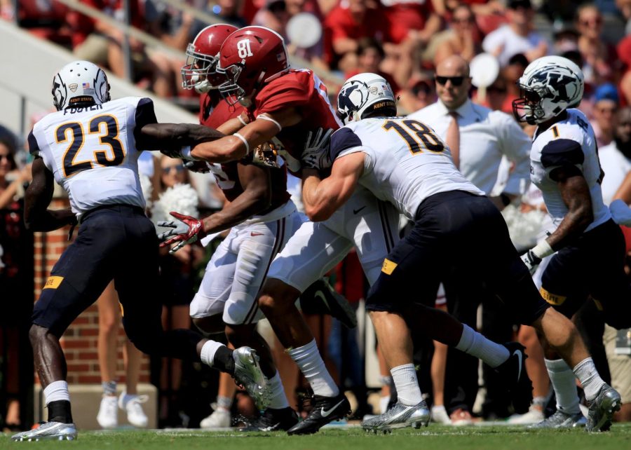 Senior safety Nate Holley tackles an Alabama ballcarrier as junior defensive back Jerrell Foster looks on. Kent State’s Flashes played the Crimson Tide at Bryant-Denny Stadium on Saturday, Sept. 24, 2016. The Flashes lost 48-0.