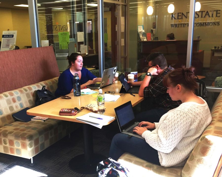 Andrew Atkins / The Kent Stater From left: Emily Risser, graduate secondary education student, Holden McCurdy, junior art education student, and Mikaela Smyk, freshman physical science student, study in the library on the 4th floor Oct 23, 2016.