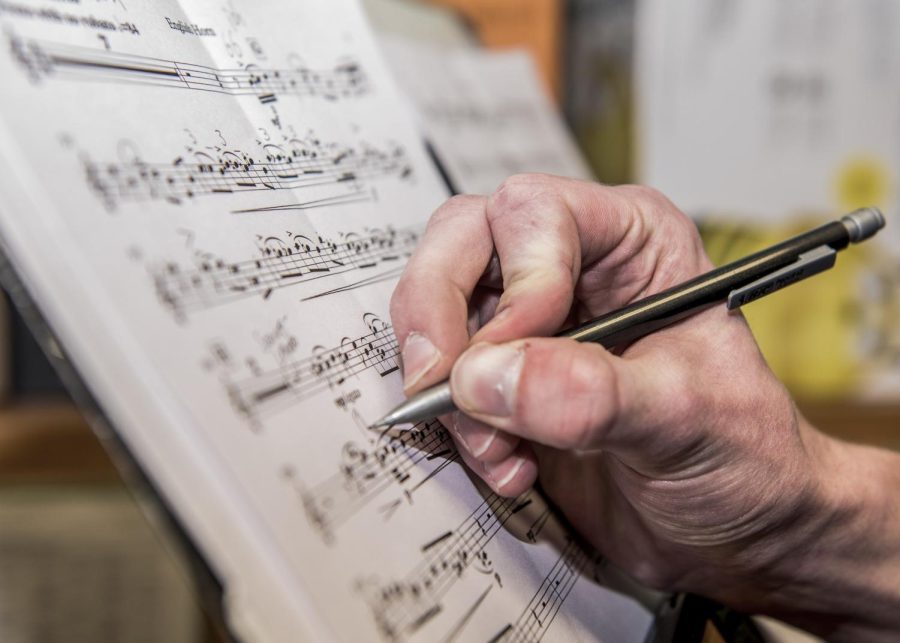 Sophomore music education student Scott Little edits the music piece he wrote for his recital in the oboe studio Oct. 24, 2016. Little will be playing an original piece of music for his sophomore recital Nov. 1.