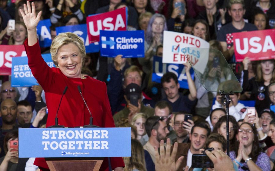 Democratic presidential nominee Hillary Clinton waves goodbye to supporters at the end of her speech at Kent State's Student Recreation and Wellness Center on Monday, Oct. 31, 2016.