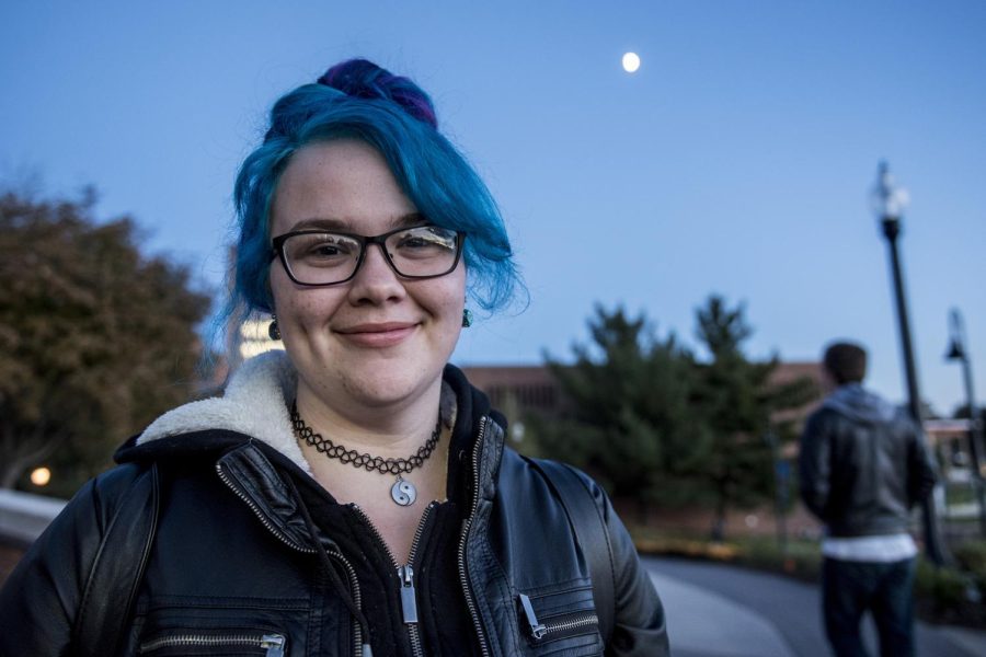 Freshman photo-illustration major Sydnie Baker shows off her blue and purple hair Oct. 10, 2016.